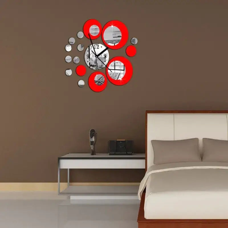 Red and silver circular mirror wall clock with a central black-and-white face.