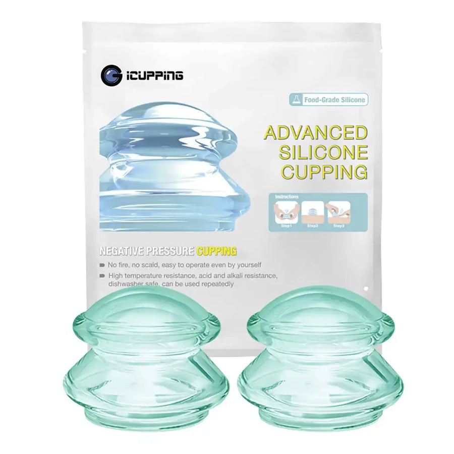 Two translucent teal silicone cupping devices with a layered, dome-shaped design.