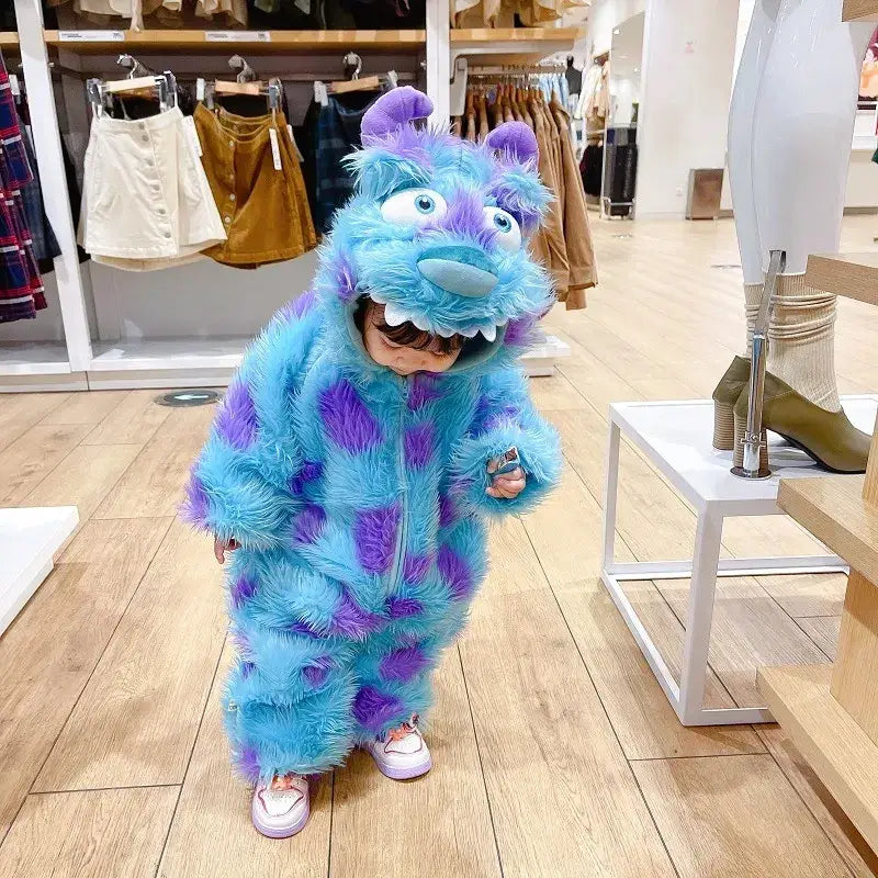 A child wearing a fluffy blue and purple sully costume from monsters, inc.
