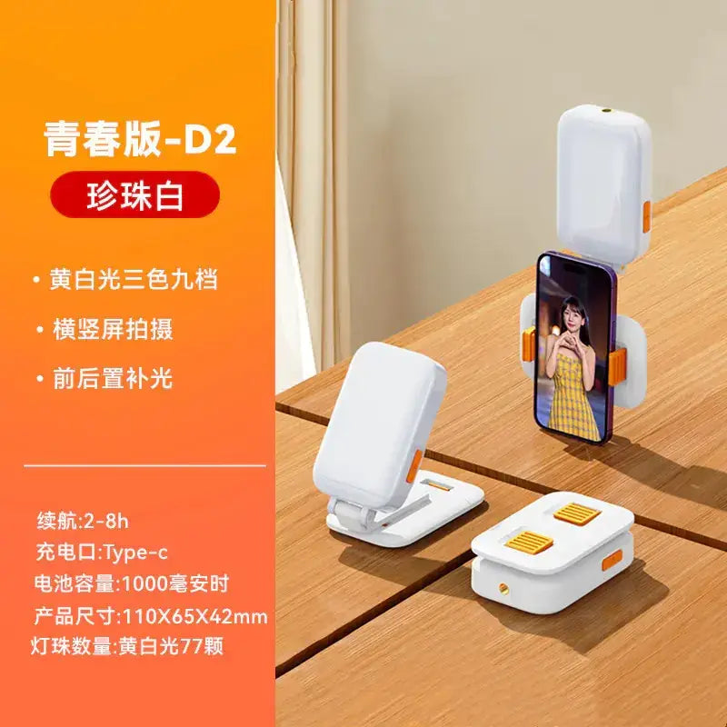 White and orange portable phone selfie stick with adjustable stand, featuring three color led lighting modes for front and rear illumination.