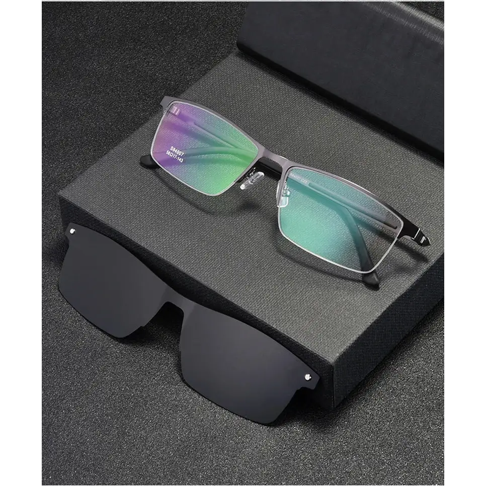 Black magnetic clip-on sunglasses with a sleek, modern design and gradient tinted lenses.