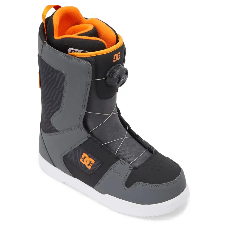 Gray and orange dc snowboard boot with a black buckle system, white sole, and textured fabric panels.