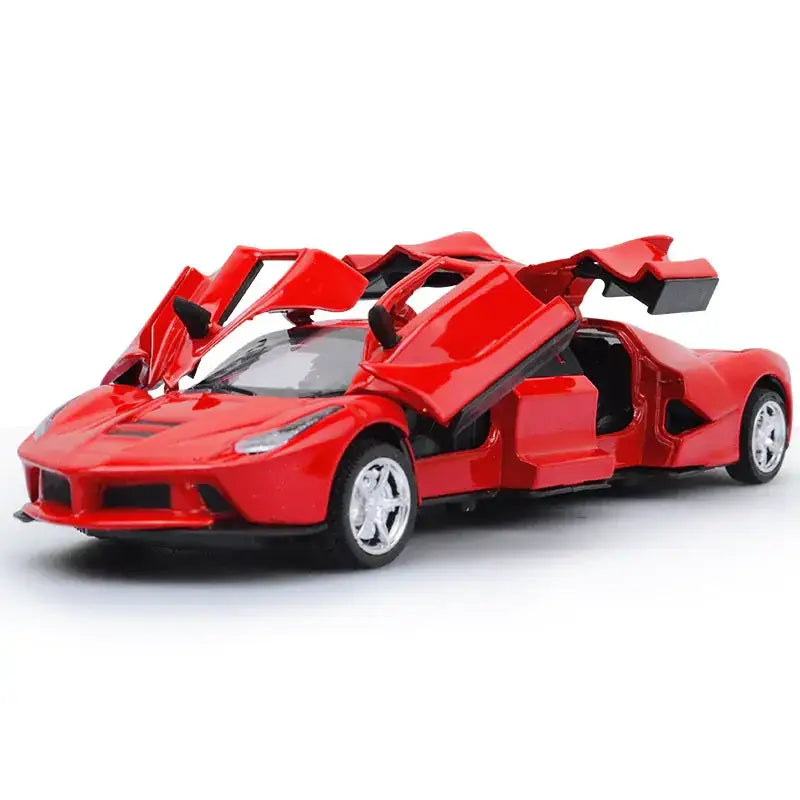 Vibrant red die-cast model of a ferrari laferrari with gull-wing doors open.