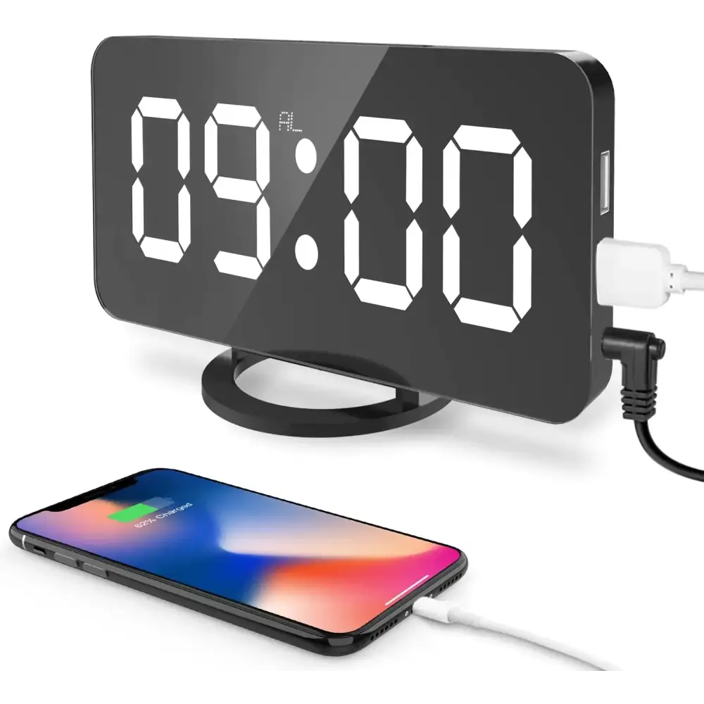 Black digital alarm clock with a sleek, glossy finish and illuminated white led numbers displaying 09:00.