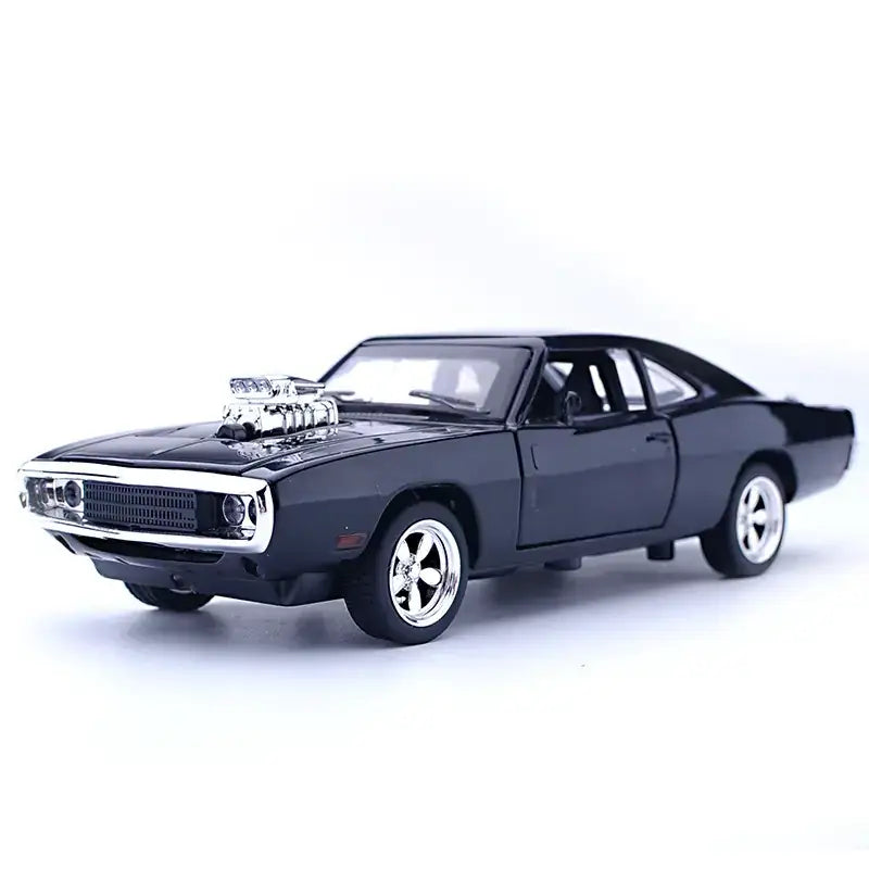 Black die-cast model of a classic muscle car with chrome accents and a prominent engine hood scoop.