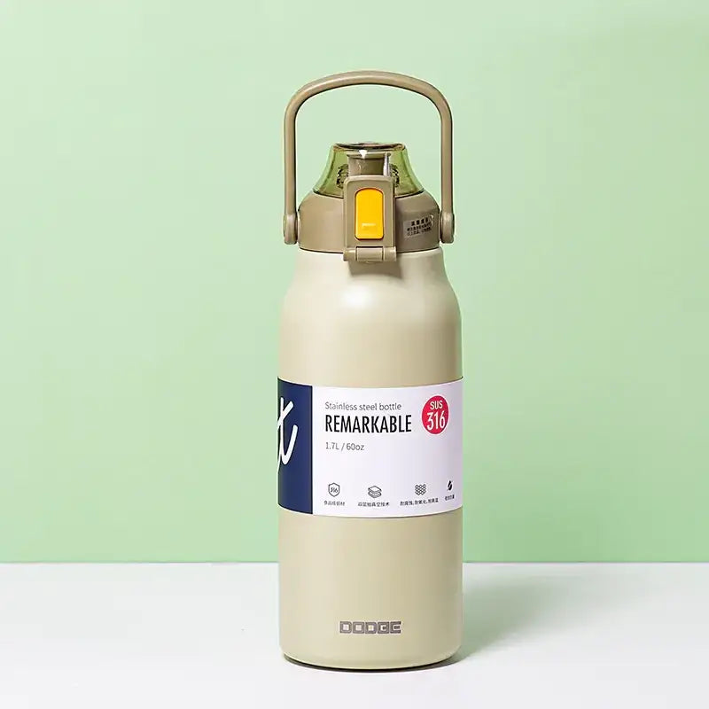 Beige stainless steel water bottle with a beige handle and yellow button, labeled ’remarkable’ by doobe.