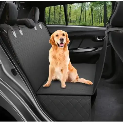 Black quilted car seat cover with a golden retriever sitting on it