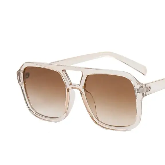 Clear acetate sunglasses with brown gradient lenses and a modern, angular design.