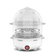 White electric egg cooker with transparent dome lid featuring a cute smiling face design and stainless steel steaming tray.