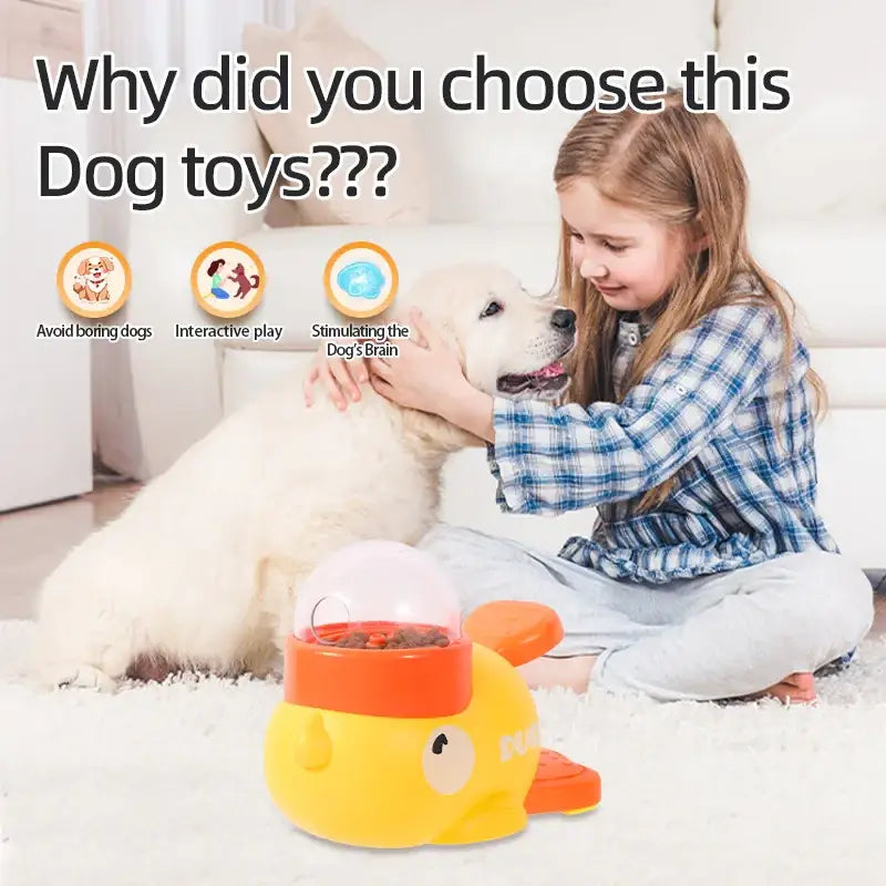 Yellow fish-shaped interactive dog toy with orange accents and a clear dome top