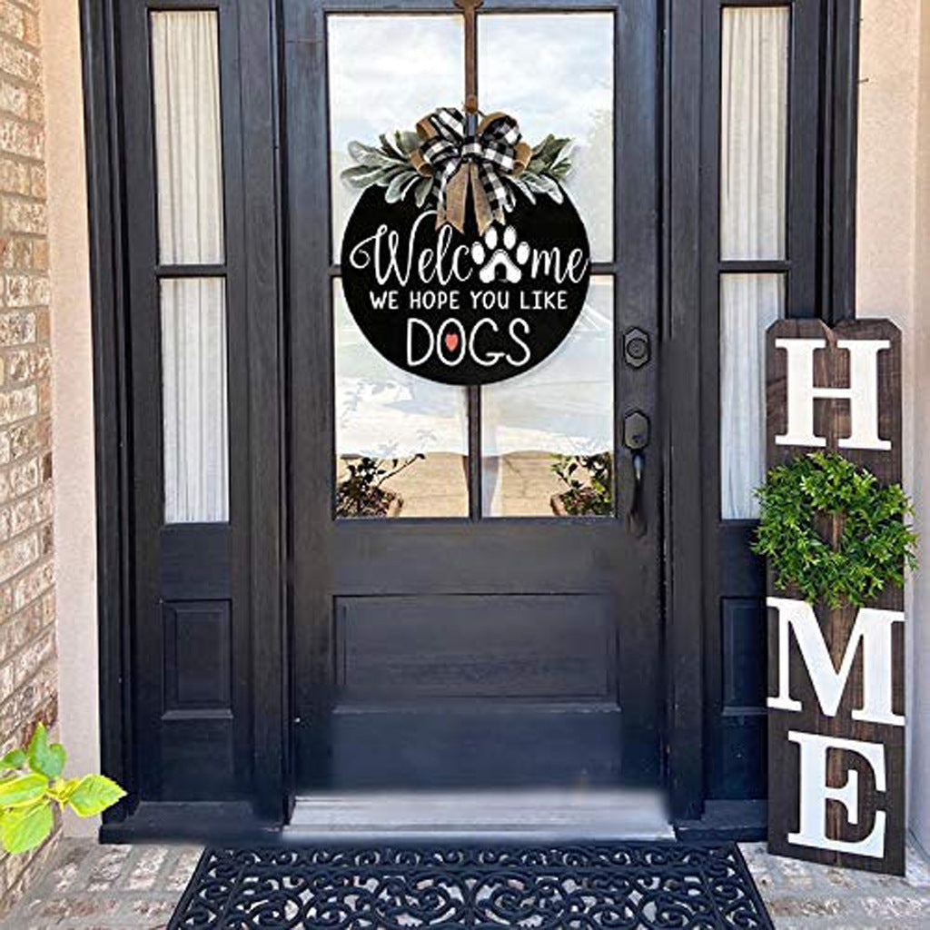 Black Round Wooden Welcome Sign with Bow Decor