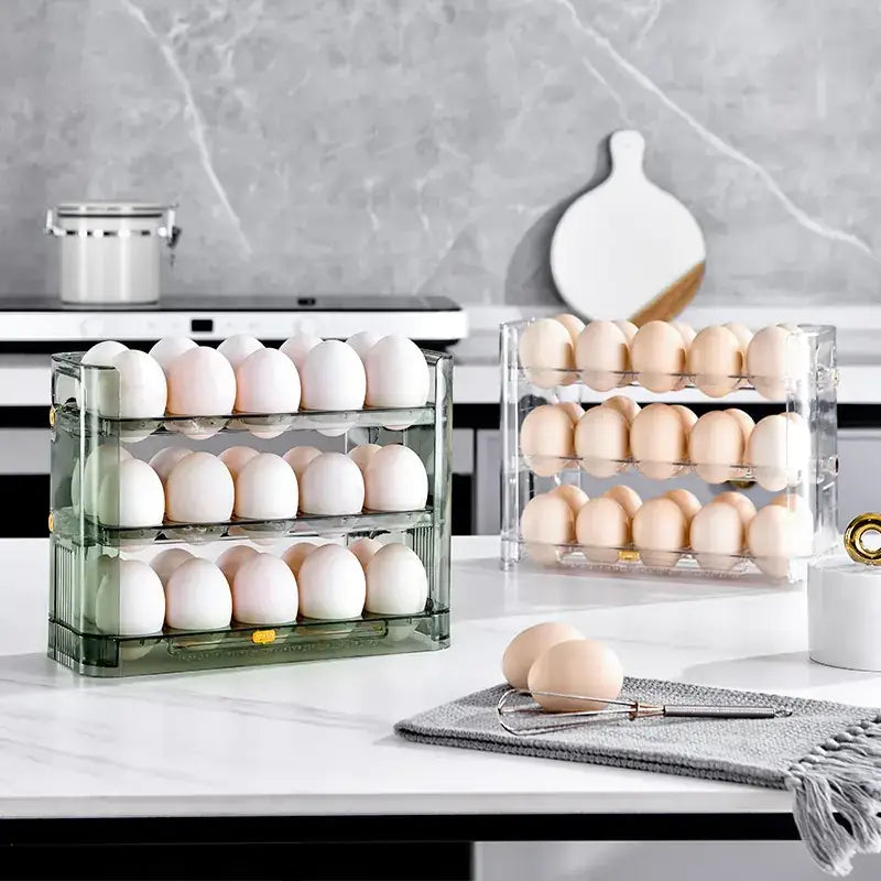 Transparent acrylic egg storage rack with three tiers, holding white and brown eggs.