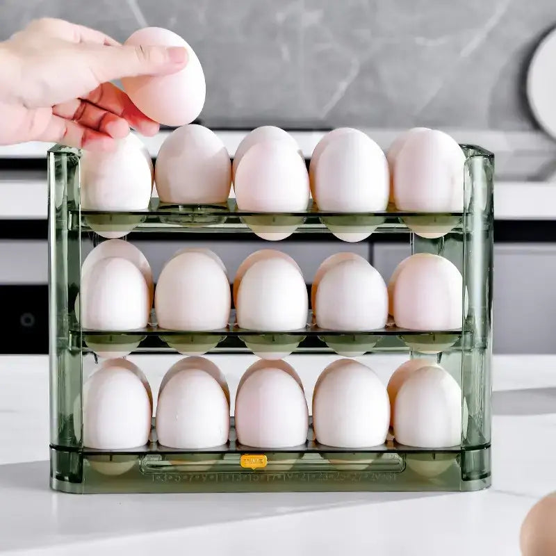 Transparent green plastic egg rack holding white eggs.