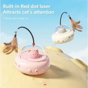 Pink cat-shaped laser pointer toy with feather attachments.