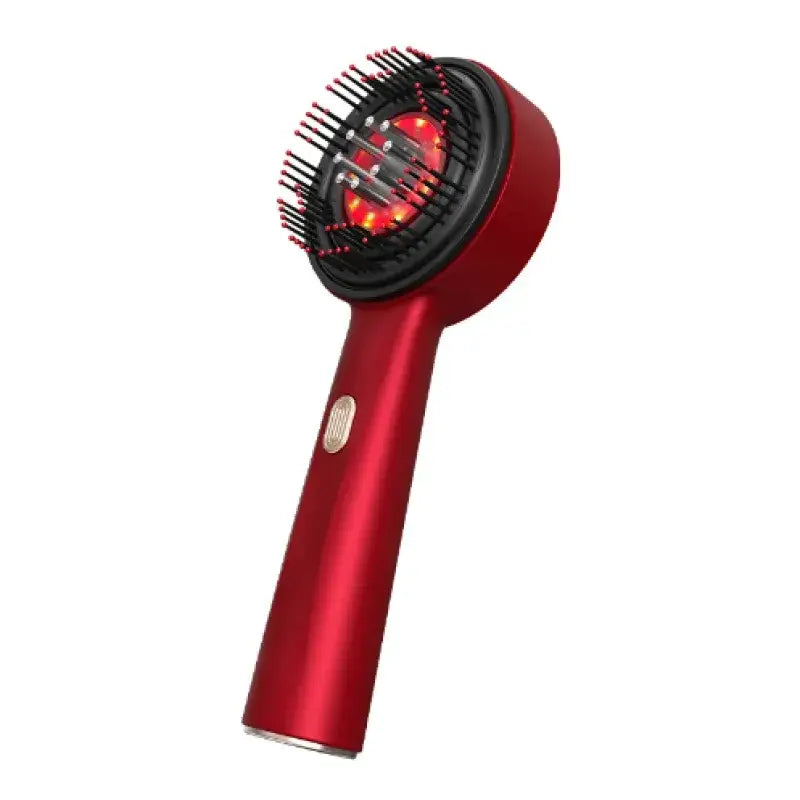 Red handheld hairbrush with black bristles and glowing red led lights on the circular head.
