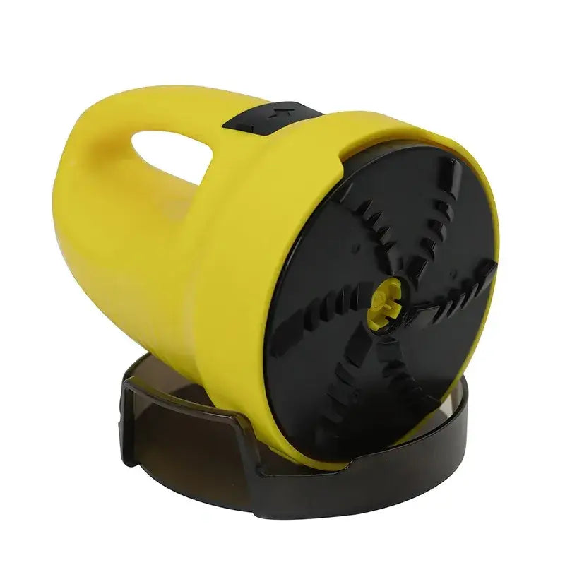 Yellow and black handheld flashlight with a textured grip and circular head featuring a central yellow button.