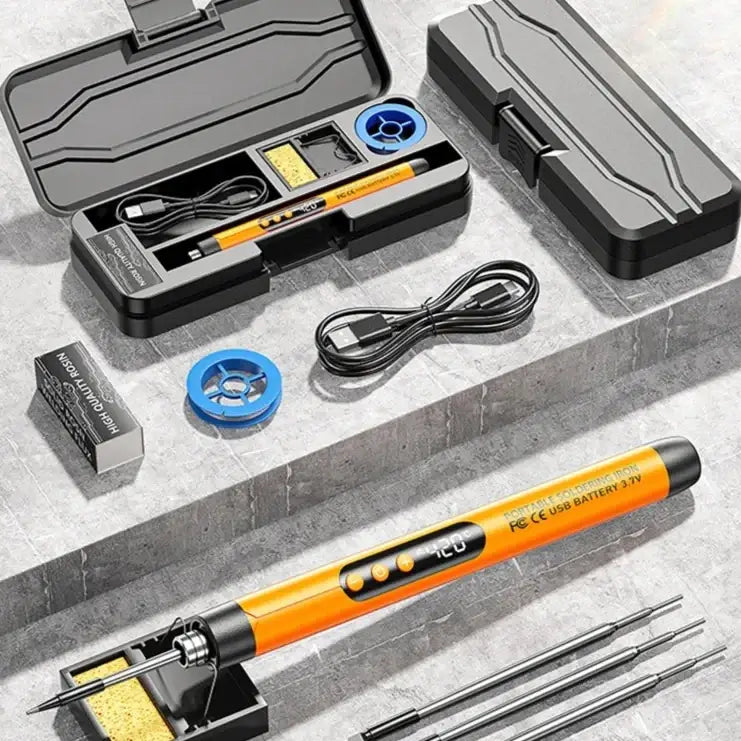 Orange portable soldering iron with digital temperature display and usb battery.