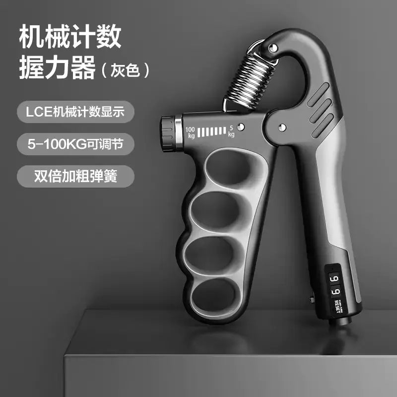 Gray lce mechanical counting grip strengthener with a digital display showing 6.5 kg and adjustable resistance from 5 to 100 kg, featuring double-thick thick springs for hand exercise.