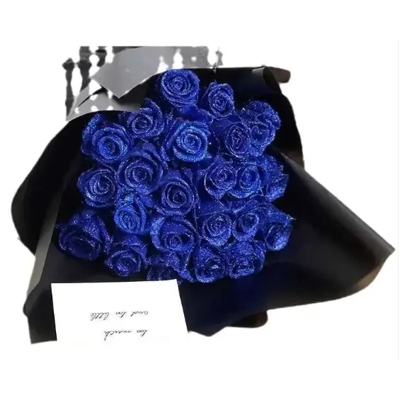 A bouquet of vibrant, glittering royal blue roses wrapped in sleek black paper.