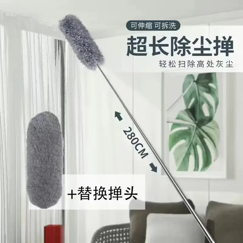 A gray, fluffy duster with a long metallic handle and an attached replacement head.