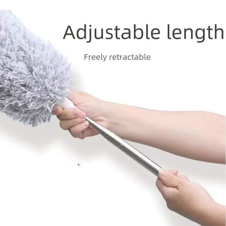 Silver metallic handle with a fluffy, light gray microfiber head on an adjustable-length retractable duster.
