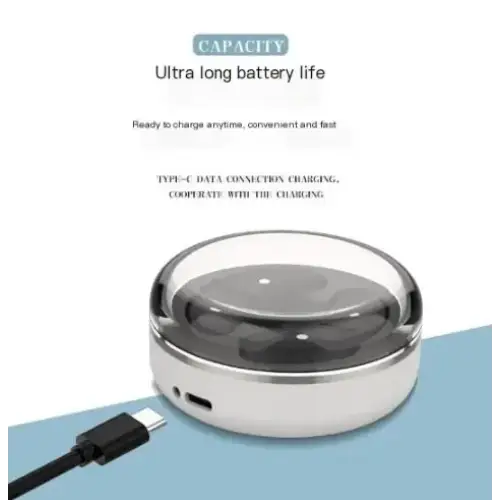 A sleek, silver and transparent circular wireless charger with a type-c port for fast charging.