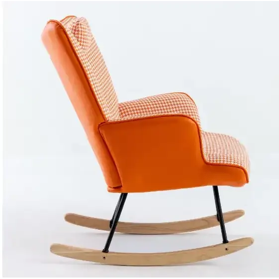 Orange upholstered rocking chair with a houndstooth pattern on the backrest and seat, featuring black metal legs and light wood rockers.