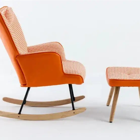 Orange upholstered rocking chair with a houndstooth pattern on the seat and backrest, featuring wooden rockers and black metal legs.