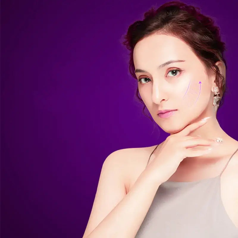 A delicate silver necklace with a small, sparkling pendant rests gently against the woman’s collarbone.