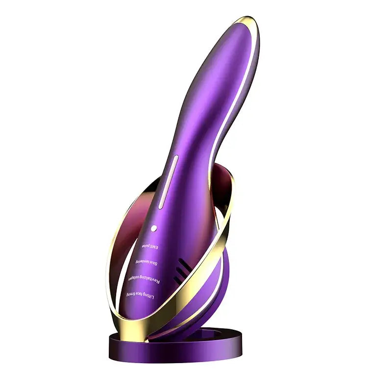 Purple and gold handheld device with sleek, ergonomic design resting in a matching stand.