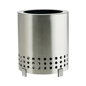 Stainless steel cylindrical fire pit with a brushed finish, featuring circular perforations along the lower half and square feet for stability.