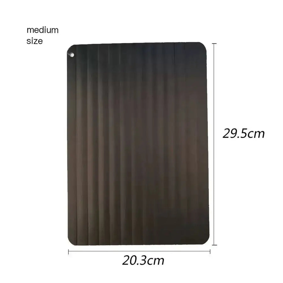 Black ribbed silicone mat, medium size.
