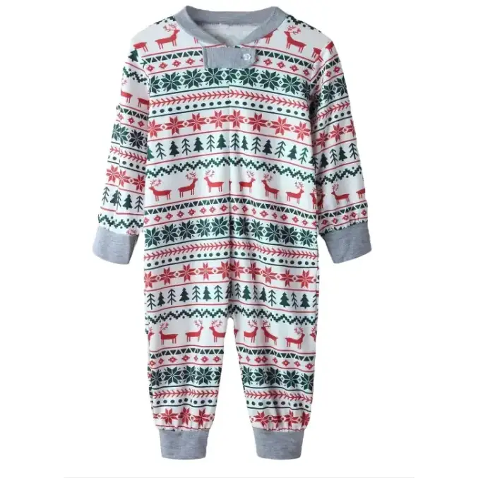 White, red and green christmas-themed onesie with reindeer, snowflakes and pine trees in a festive pattern.