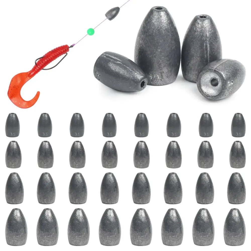 Set of dark gray, metallic fishing sinkers with a red and orange lure for bait.