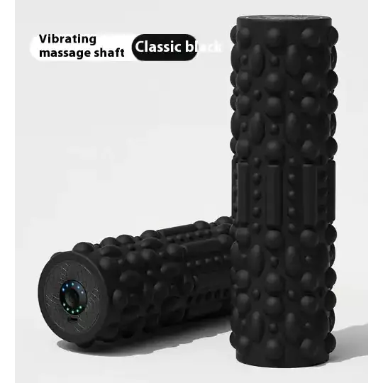 Black vibrating massage shaft with a textured, bumpy surface and a circular control panel at one end.