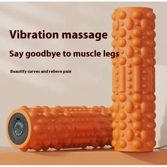 Orange vibration massage roller with textured, bumpy surface and a digital display on one end.
