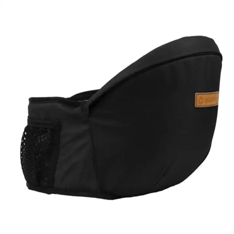 Black fabric baby carrier with a mesh pocket and a tan leather brand patch.