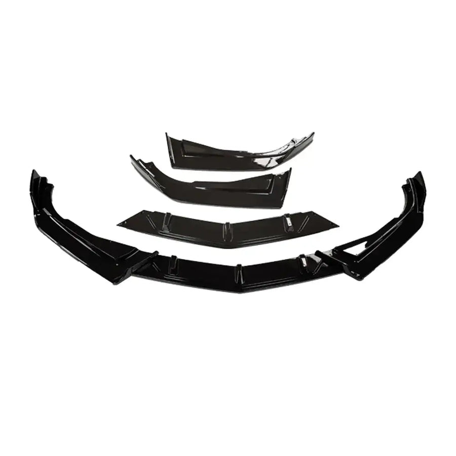 Black glossy carbon fiber front bumper kit for a car.