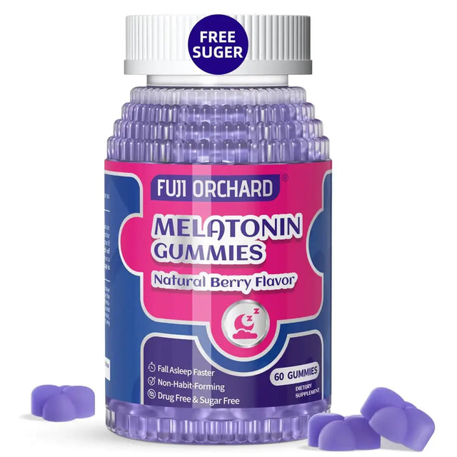 A vibrant pink and blue labeled bottle of fuji orchard melatonin gummies, featuring a white ribbed cap with ’free sugar’ printed on it.
