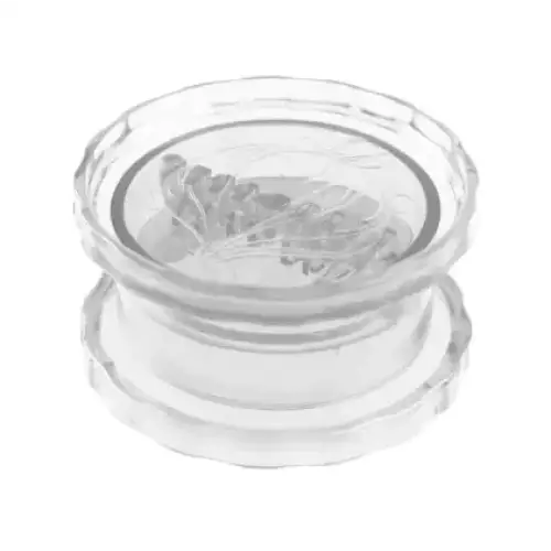 Clear glass coaster with a subtle etched leaf design.