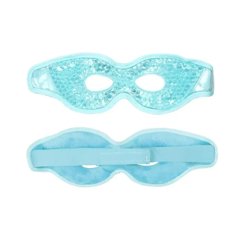 Light blue gel-filled eye mask with a clear, textured surface and adjustable strap.