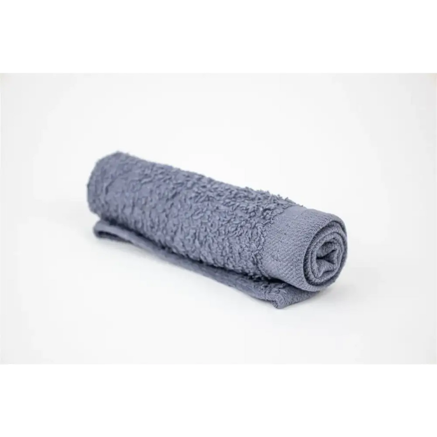 A neatly rolled gray terry cloth towel with a soft, plush texture.
