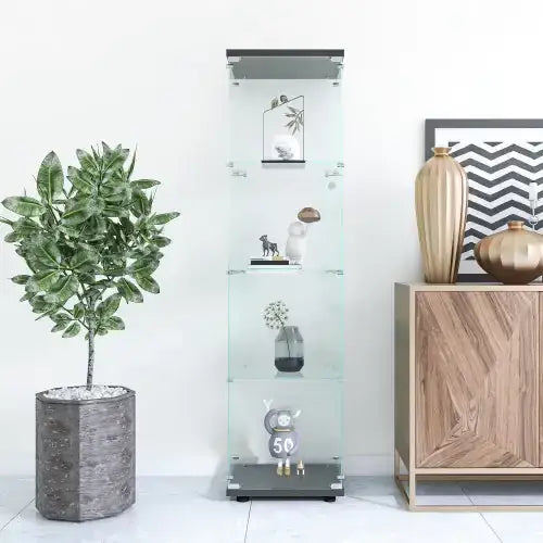 Modern glass display cabinet with sleek black frame and silver accents, showcasing decorative items on each shelf.