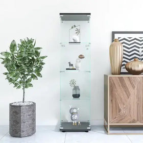 Modern glass display cabinet with sleek black frame and silver accents, showcasing decorative items on each shelf.