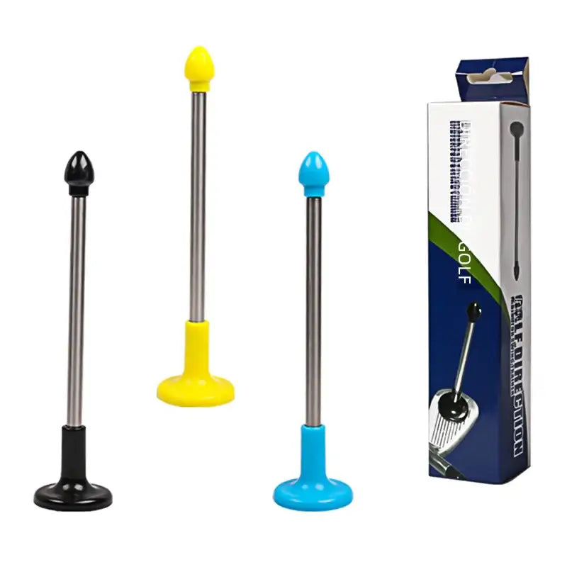 Three golf swing trainers with metallic shafts and colorful rubber tips in black, yellow, and blue.