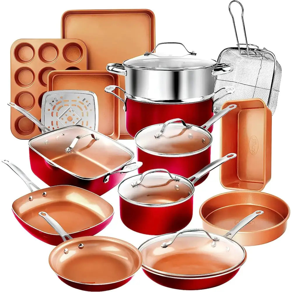 Red copper-colored nonstick cookware set with stainless steel handles and glass lids.