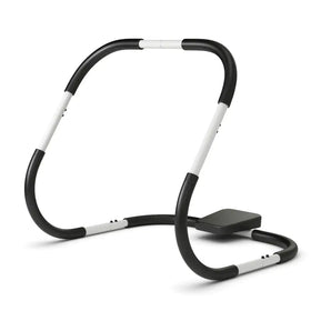 Black and white adjustable ab workout machine with padded grips.