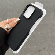 Black matte phone case with a white camera cutout and rounded edges.