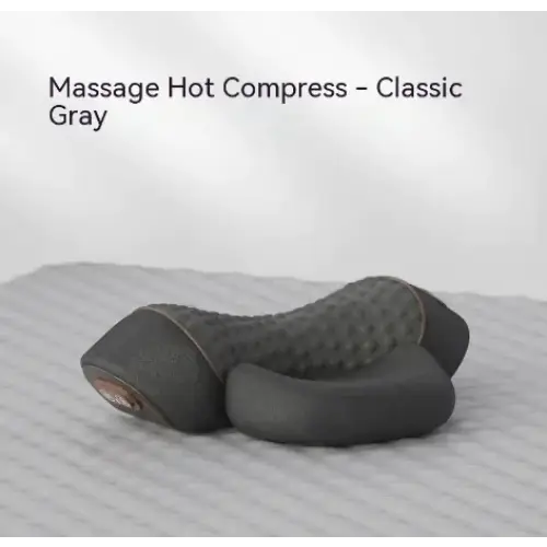 Classic gray massage hot compress with a textured, quilted surface and contoured design for targeted neck and shoulder relief.