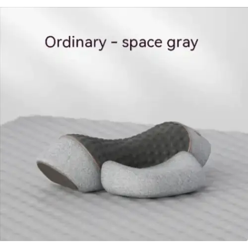 Space gray, textured ergonomic pillow with a sleek, modern design.